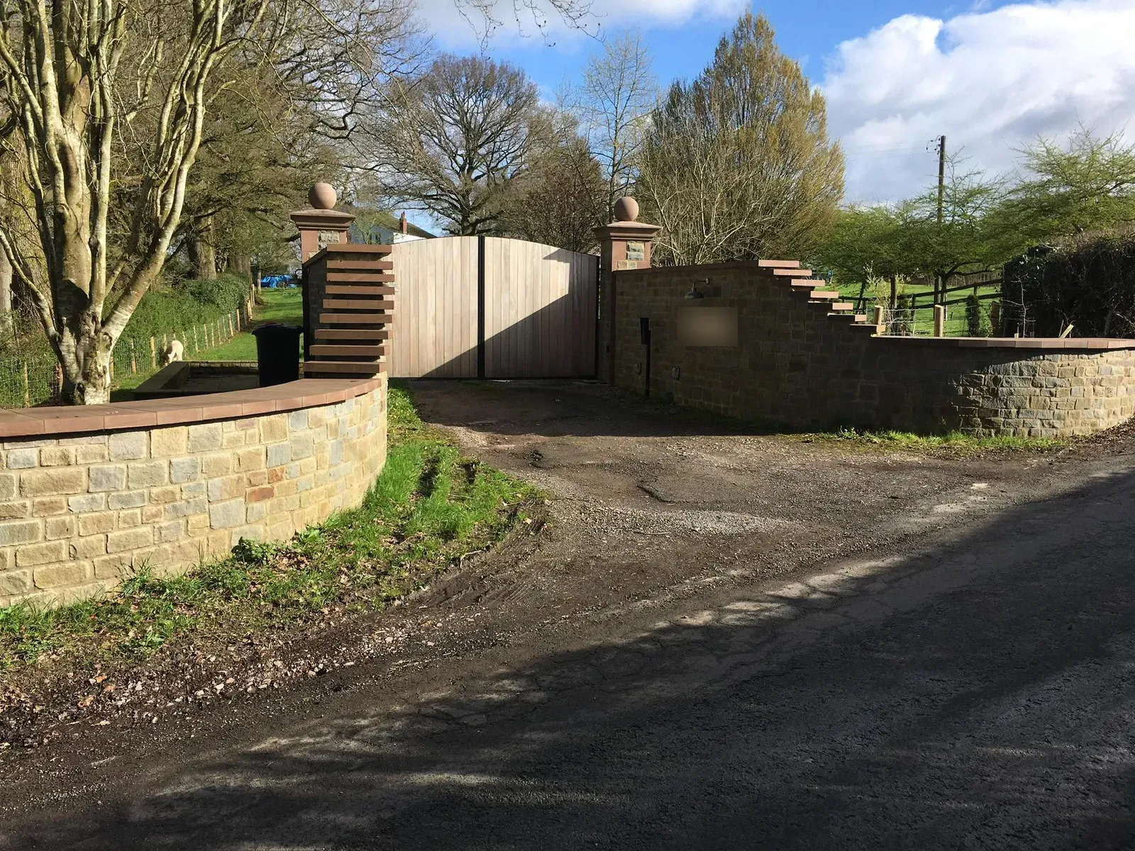 Entrance walls and drive