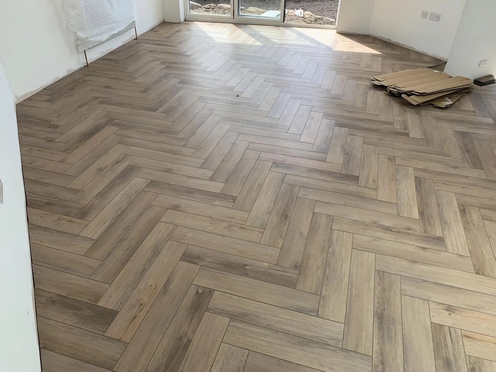 Herringbone wood-effect floor
