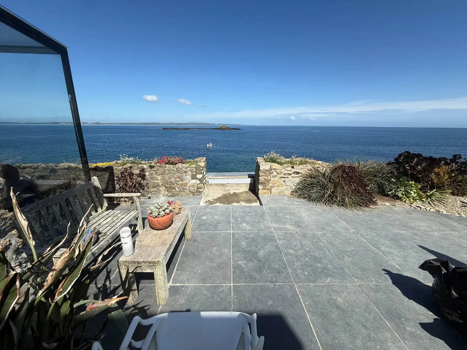 Paved terrace looking out to sea