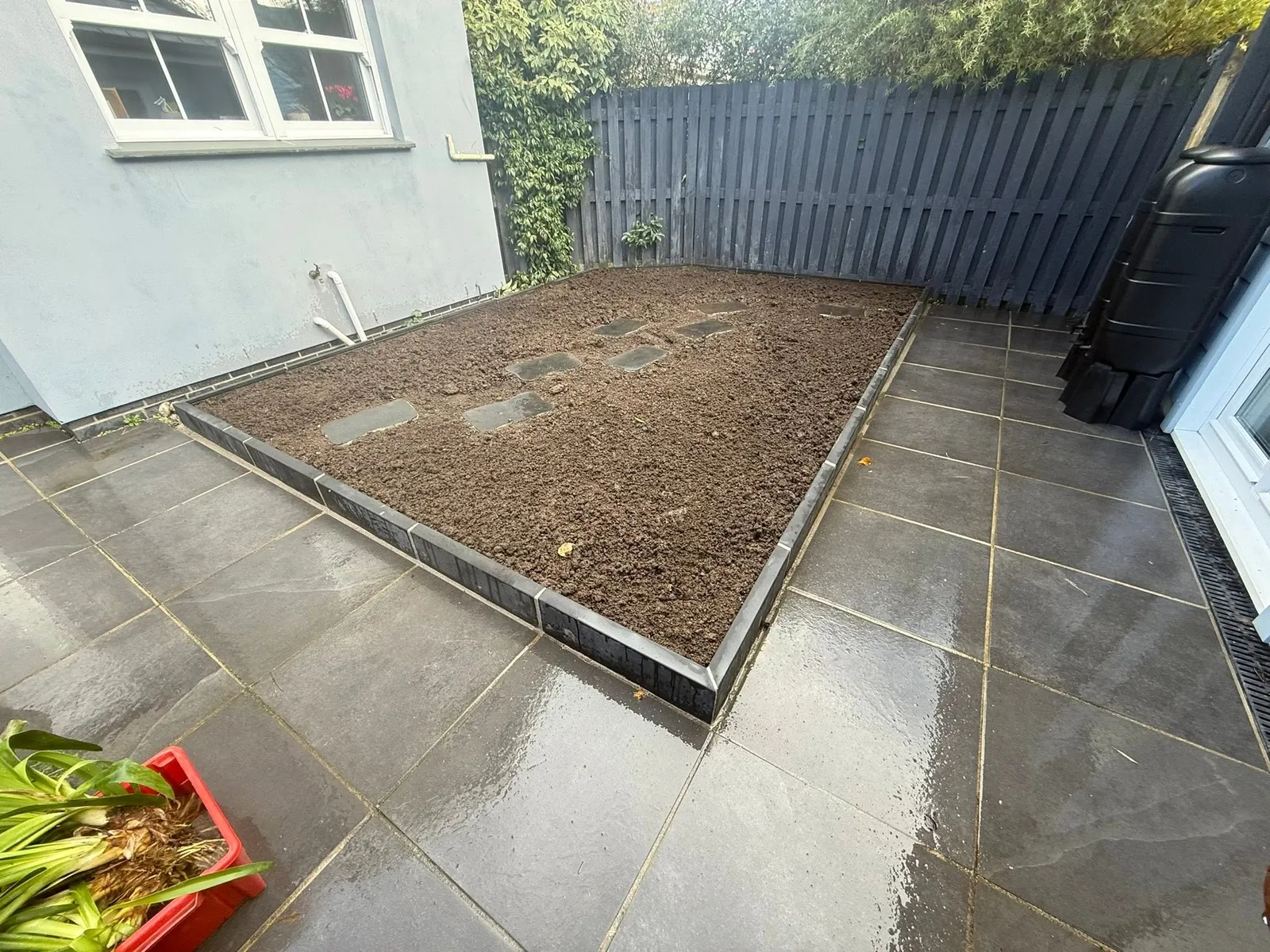 Patio with a planting bed