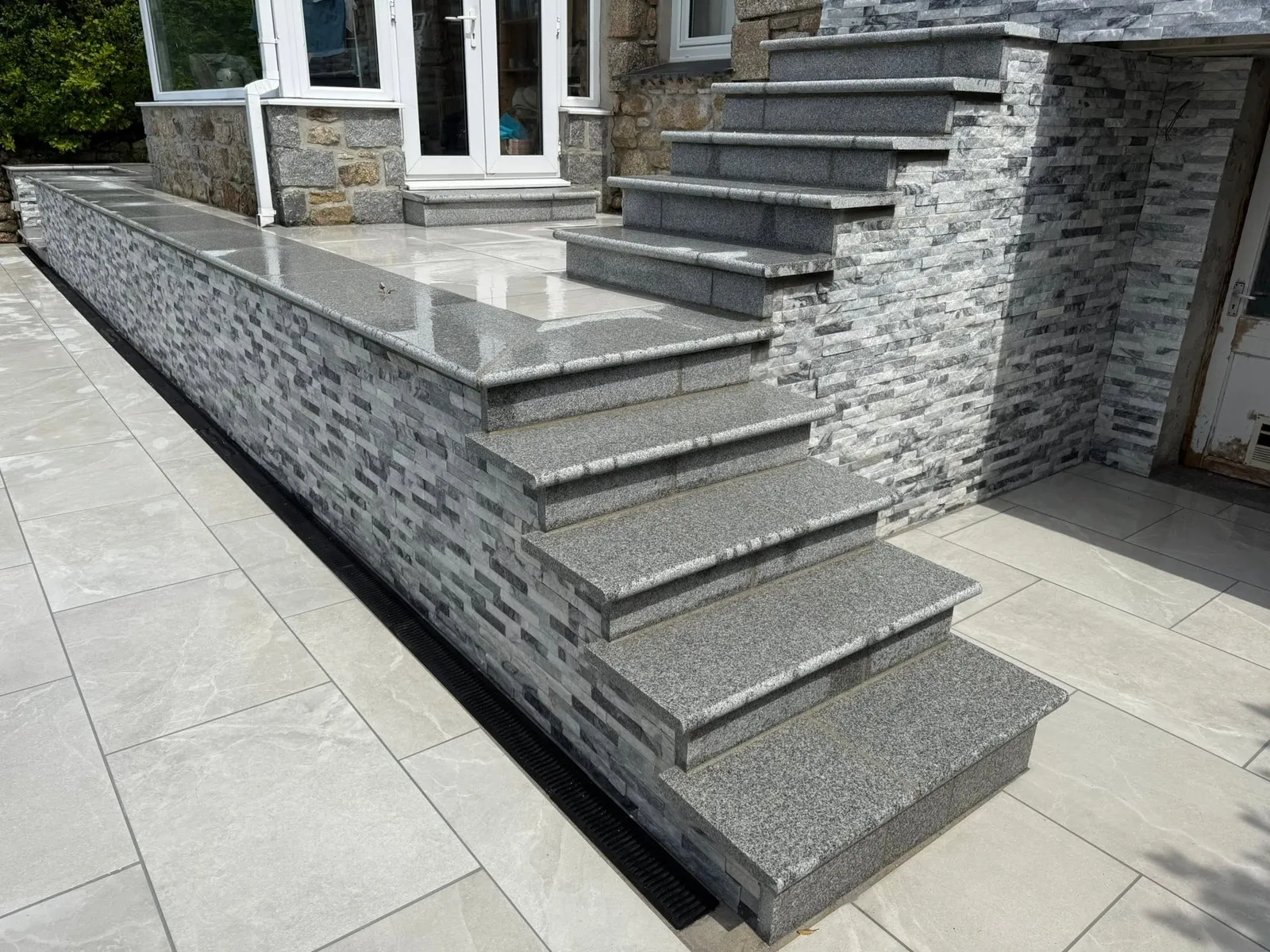 Stone steps and paved terrace