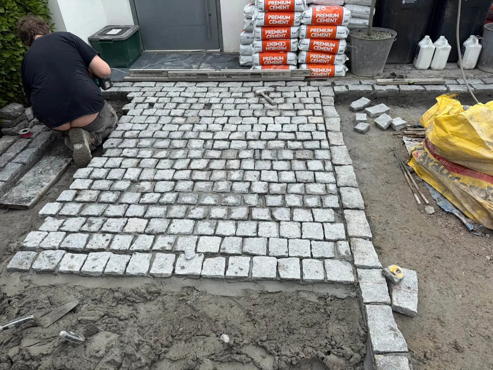 Setts going down on a fresh base