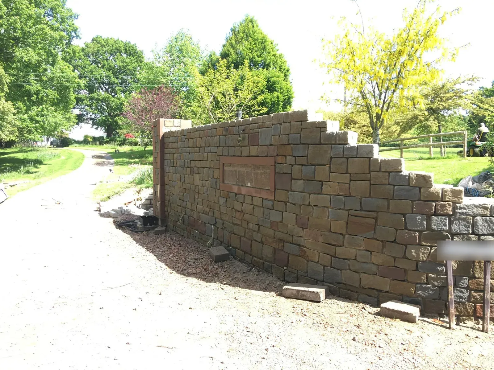 Curved stone wall and pier